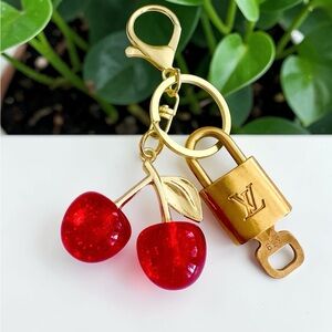 Authentic Louis Vuitton Padlock with Cherry Bag Charm